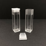 One closed cuvette and one open cuvette for fluorescence and absorption measurements in spectrometer instrumentation 